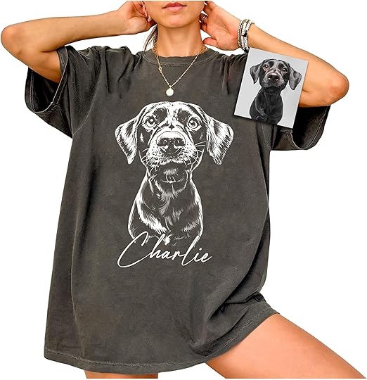 girl wearing gray shirt with picture of dog