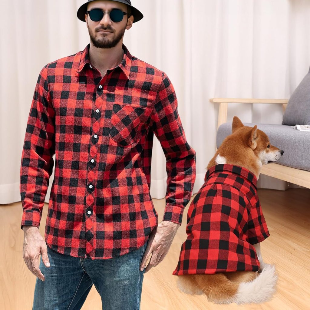 man and dog wearing matching shirts