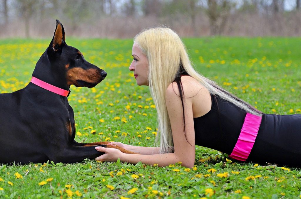 dog and woman matching pink