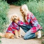 dog and owner wearing matching shirts