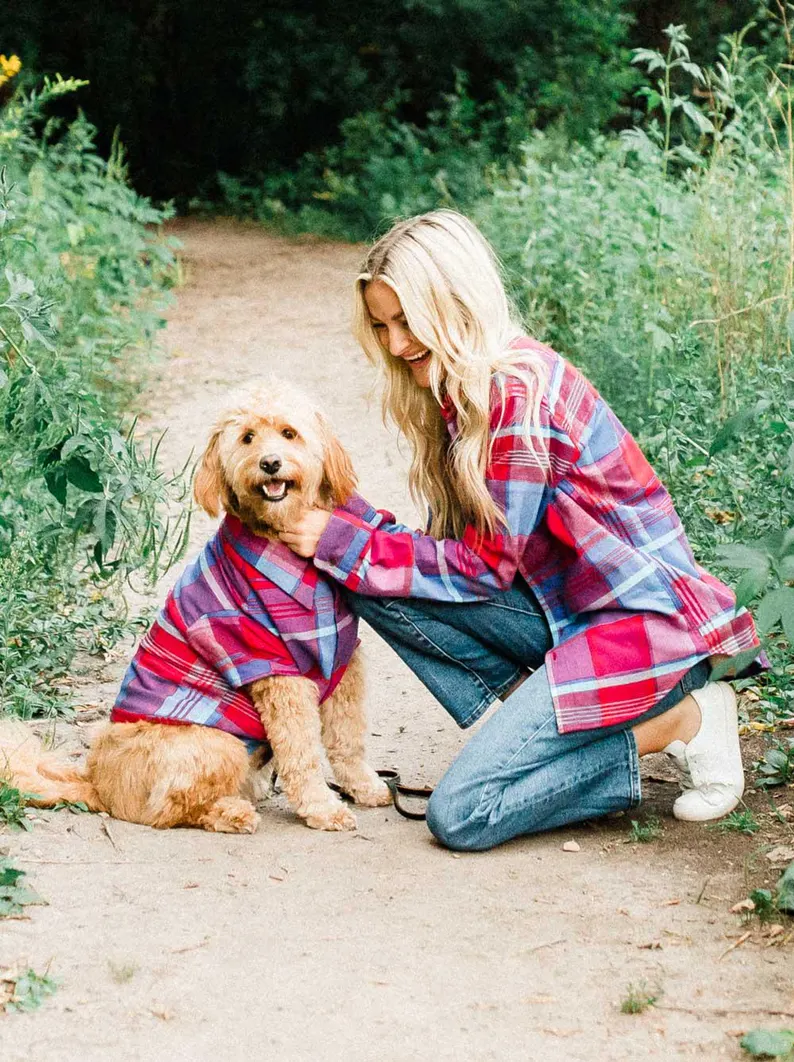 dog and owner wearing matching shirts