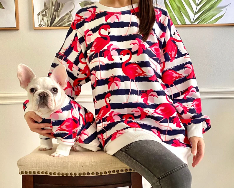 dog and woman wearing matching shirts