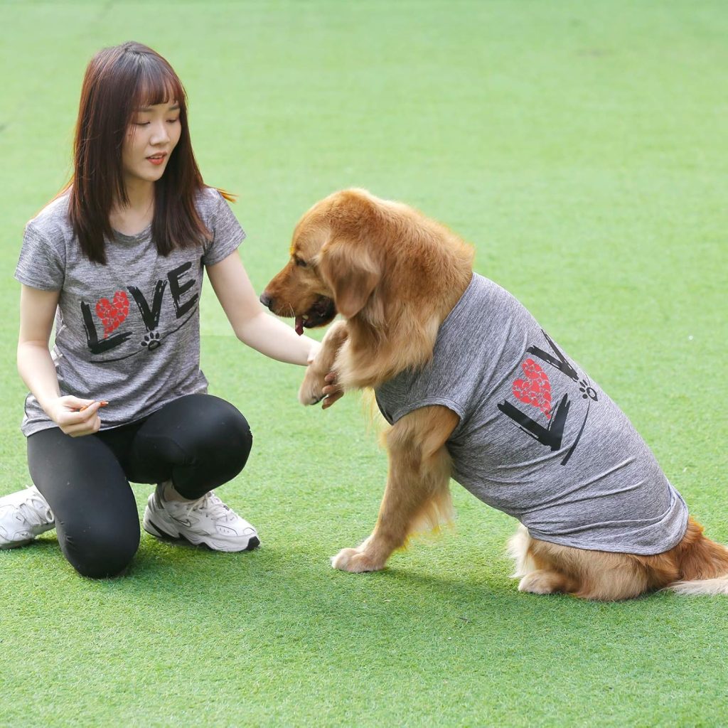 dog and owner wearing matching shirts