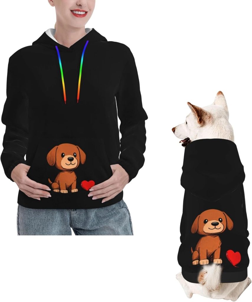 man and dog wearing matching hoodies