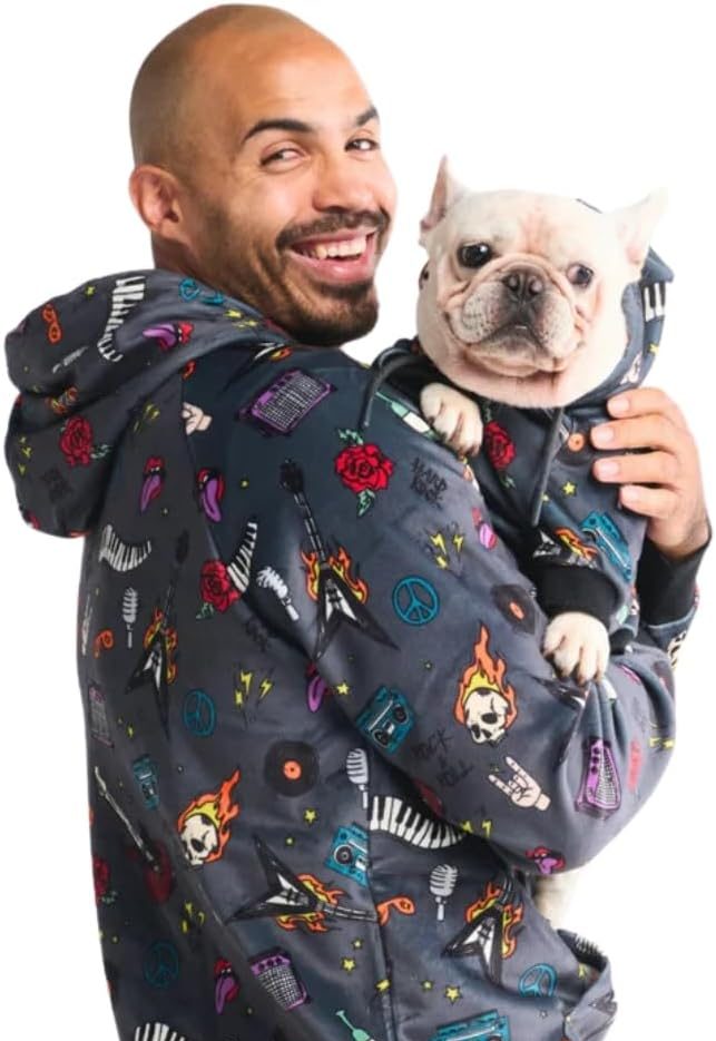 man and dog wearing matching gray hoodies
