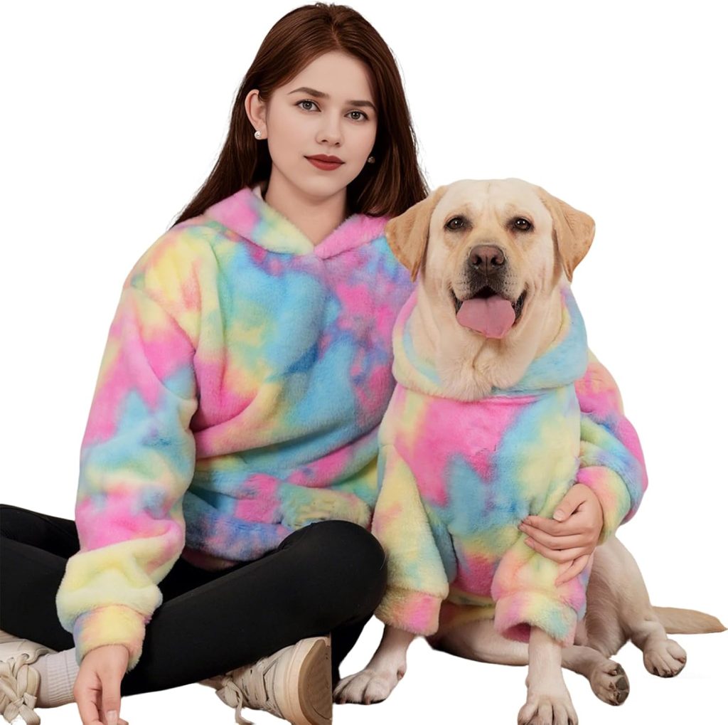 woman and dog wearing matching hoodies